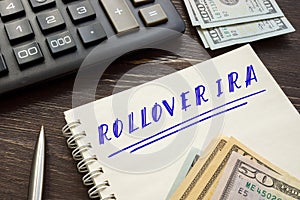 Business concept meaning ROLLOVER IRA with phrase on the piece of paper