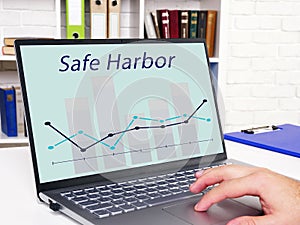 Business concept meaning Safe Harbor with sign on the page