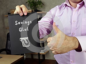 Business concept meaning Savings Glut 5 with sign on the page