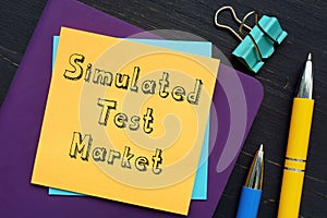 Business concept meaning Simulated Test Market with inscription on the page