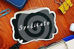 Business concept meaning Syndicate with phrase on the page photo