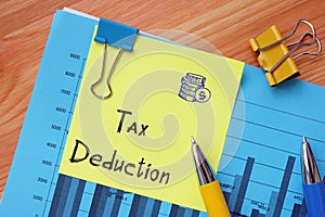 Business concept meaning Tax Deduction with inscription on the page