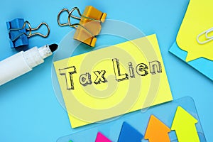 Business concept meaning Tax Lien with inscription on the sheet photo