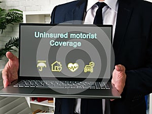 Business concept meaning Uninsured motorist Coverage with phrase on the page