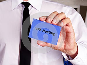Business concept meaning VPS Hosting with phrase on the sheet