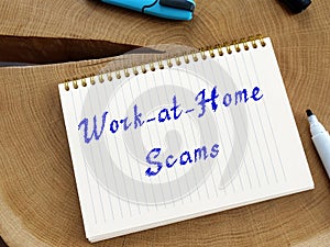 Business concept meaning Work-at-Home Scams with sign on the page