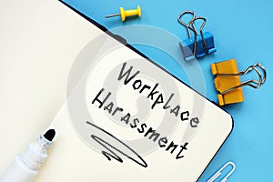 Business concept meaning Workplace Harassment with phrase on the page