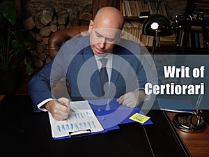 Business concept meaning Writ of Certiorari . Closeup portrait of unrecognizable successful businessman wearing formal suit