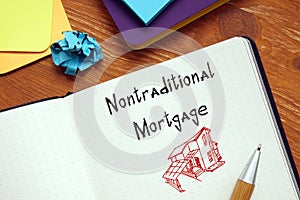 Business concept about Nontraditional Mortgage with inscription on the sheet photo