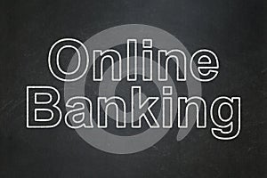 Business concept: Online Banking on chalkboard background