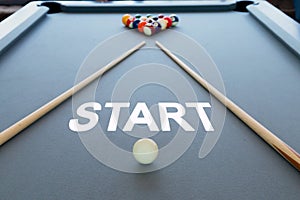 Business concept picture of start in the snooker billiard pool table with balls set, selective focus