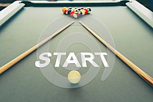 Business concept picture of start in the snooker billiard pool table with balls set, selective focus and vintage photo