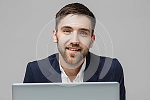Business Concept - Portrait Handsome Business man playing digital notebook with smiling confident face. White Background.Copy Spac