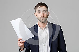 Business Concept - Portrait Handsome Business man serious working with annual report. isolated White Background. Copy space.