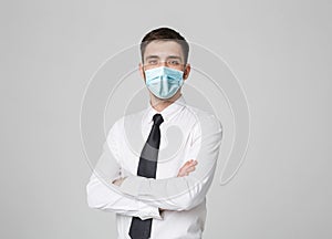 Business Concept - Portrait Handsome Businessman in face mask holding hands with confident face. White Background.