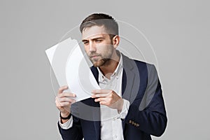 Business Concept - Portrait of a handsome businessman in suit with glasses serious thinking with stressful facial expression. Isol