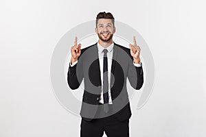 Business Concept: Portrait handsome young businessman point finger on side to empty copy space. Isolated over white