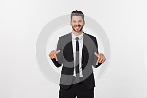 Business Concept: Portrait handsome young businessman point finger on side to empty copy space. Isolated over white