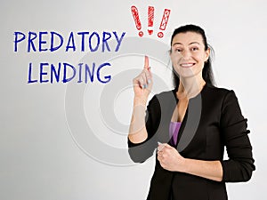 Business concept about PREDATORY LENDING exclamation marks with inscription on the wall