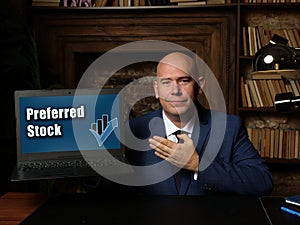 Business concept about Preferred Stock with sign on laptop in hand