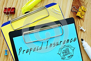 Business concept about Prepaid Insurance with sign on the page