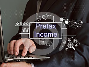 Business concept about Pretax Income with inscription on the sheet