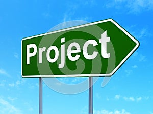 Business concept: Project on road sign background