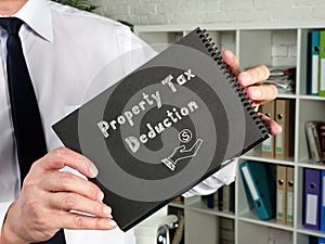 Business concept about Property Tax Deduction with sign on the page