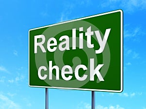 Business concept: Reality Check on road sign background