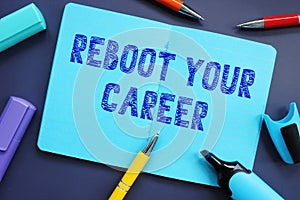 Business concept about Reboot Your Career with inscription on the piece of paper