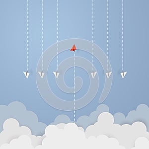 Business concept. Red paper leader airplane flying on blue sky