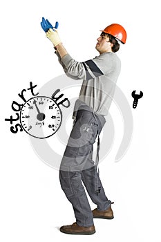 Business concept of self-made man. Young laborer man in orange helmet over white background with sketches.