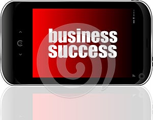 Business concept: smartphone with text business success on display