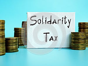 Business concept about Solidarity Tax with inscription on the page