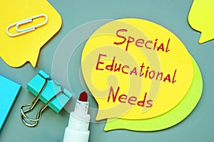 Business concept about Special Educational Needs with sign on the piece of paper photo