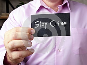 Business concept about Stop Crime  with phrase on the sheet