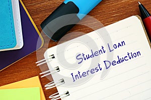 Business concept about Student Loan Interest Deduction with inscription on the page