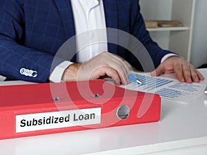 Business concept about Subsidized Loan with phrase on the dossier