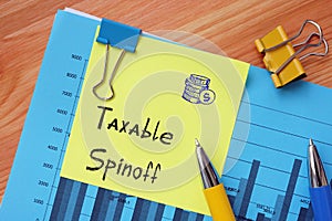 Business concept about Taxable Spinoff with phrase on the piece of paper