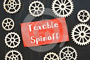 Business concept about Taxable Spinoff with sign on the page