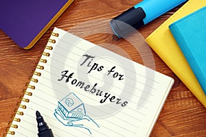 Business concept about Tips For Homebuyers with sign on the sheet photo