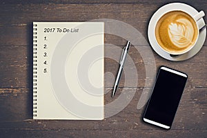 Business concept - Top view notebook writing 2017 To Do List, pe