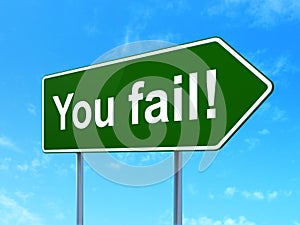 Business concept: You Fail! on road sign background