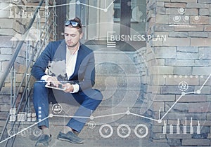 Business concept. Young man using tablet