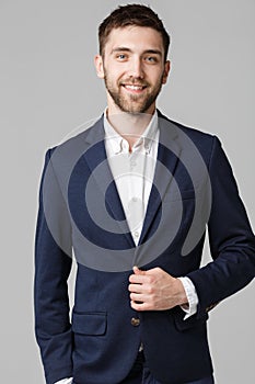 Business Concept - Young successful businessman posing over dark background. Isolated White Background. Copy space.