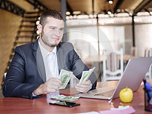 Business consultants while working in a team.A group of young workers at a meeting in the company conference room