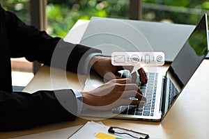 Business Contact Us concept, Hands typing on keyboard computer with communication contact icon, E-mail, Phone number, Social media