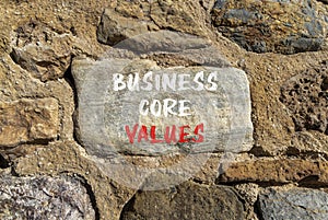 Business core values symbol. Concept words Business core values on beautiful big stone on stone wall. Beautiful stone wall