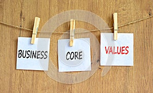 Business core values symbol. Concept words Business core values on beautiful white paper on clothespin. Beautiful wooden