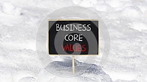 Business core values symbol. Concept words Business core values on beautiful black chalk blackboard. Beautiful snow background.